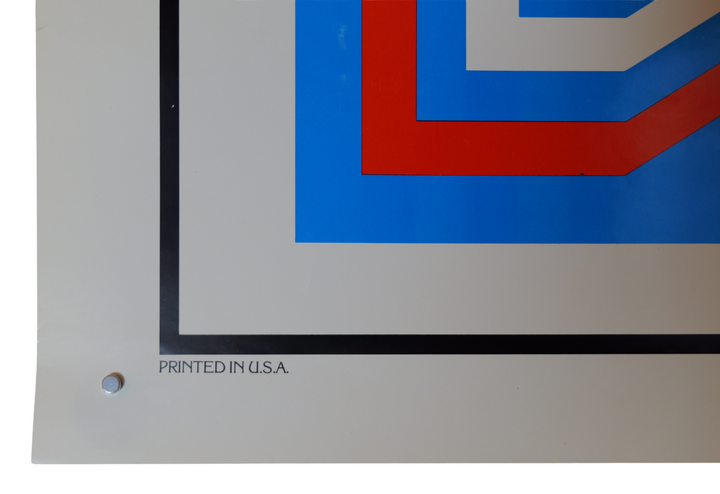 Close-up of a graphic design with red and blue shapes on a white background, featuring 'Printed in U.S.A.' text.