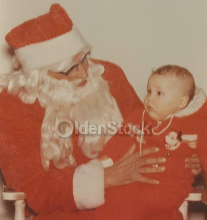 Cute Baby in Christmas Jumper Sits on Santa's Lap Vintage Americana Snapshot Photo