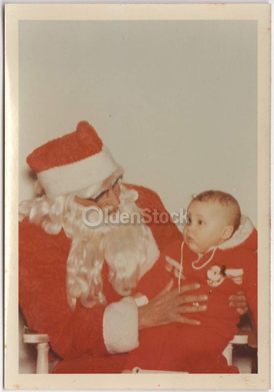 Cute Baby in Christmas Jumper Sits on Santa's Lap Vintage Americana Snapshot Photo