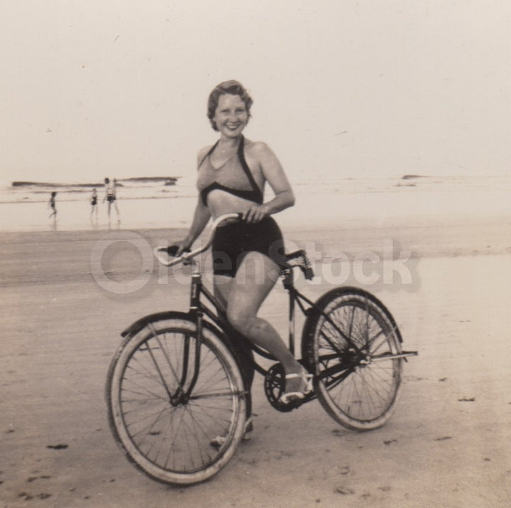 Lovely Beach Woman Riding Bicycle VIntage 1960s Snapshot Photo