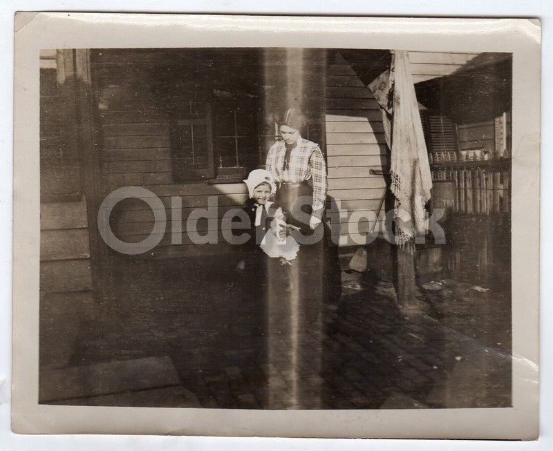 Cute Little Girl with her Red Cross Nurse Doll Outside Antique Snapshot Photo