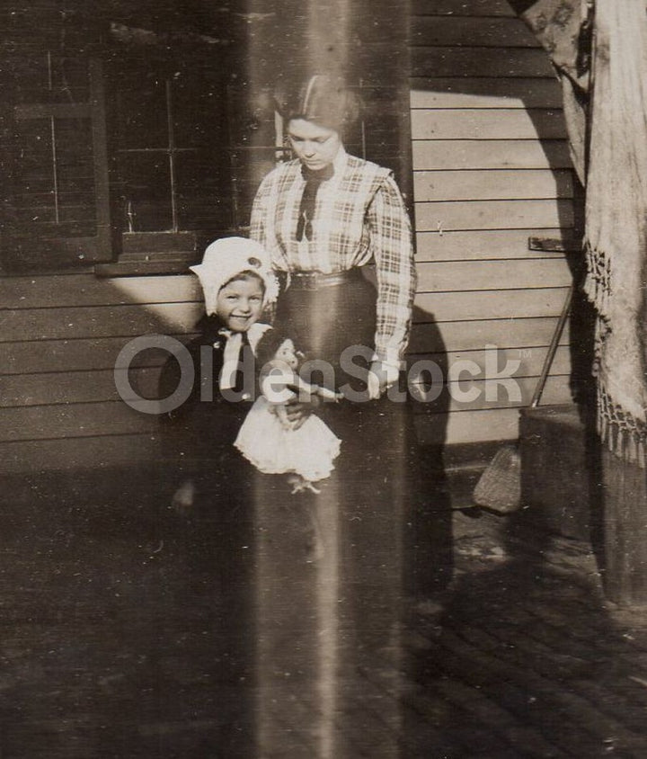 Cute Little Girl with her Red Cross Nurse Doll Outside Antique Snapshot Photo